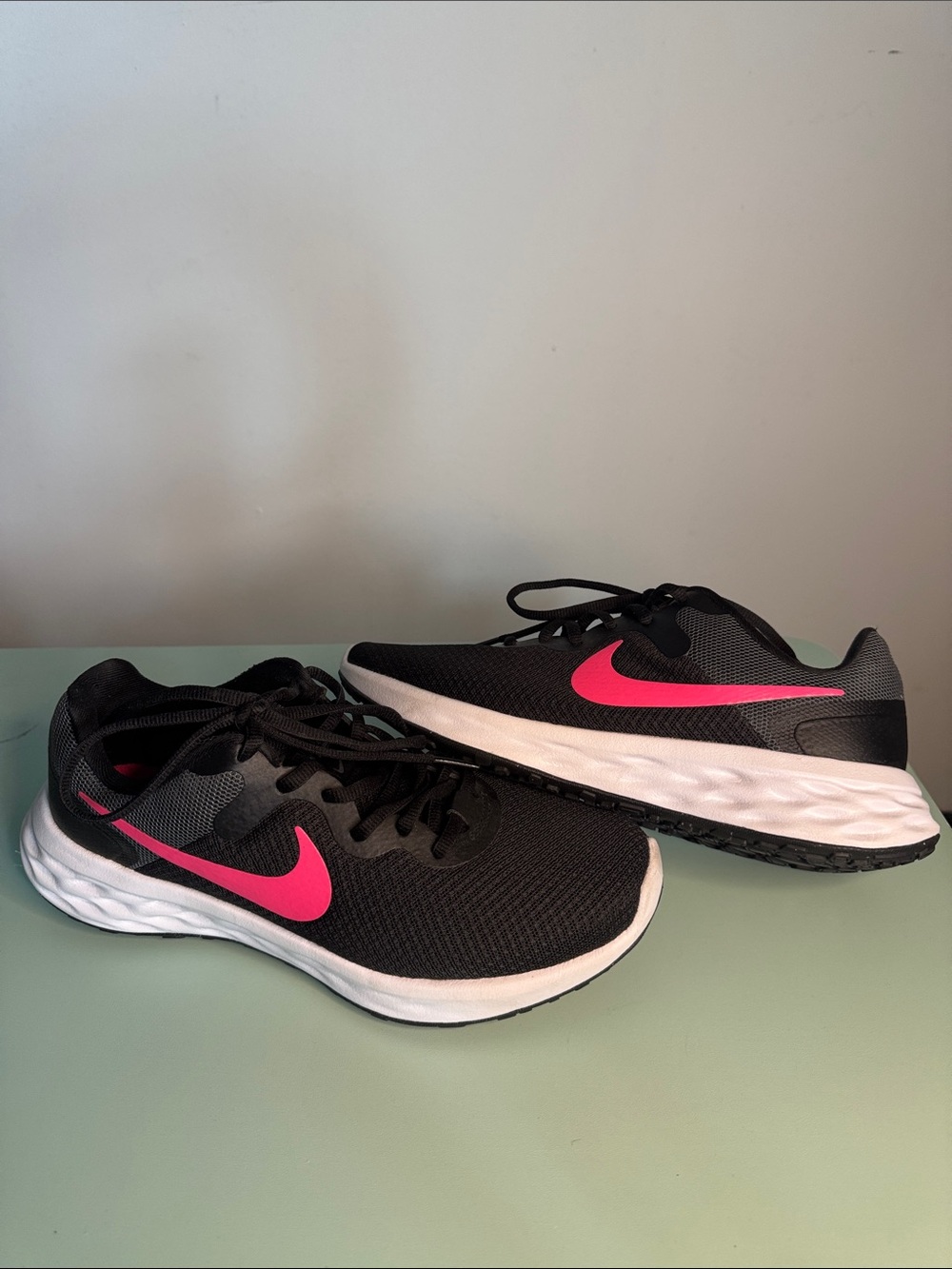 Nike Women's Black Running Shoes with Hot Pink Swoosh